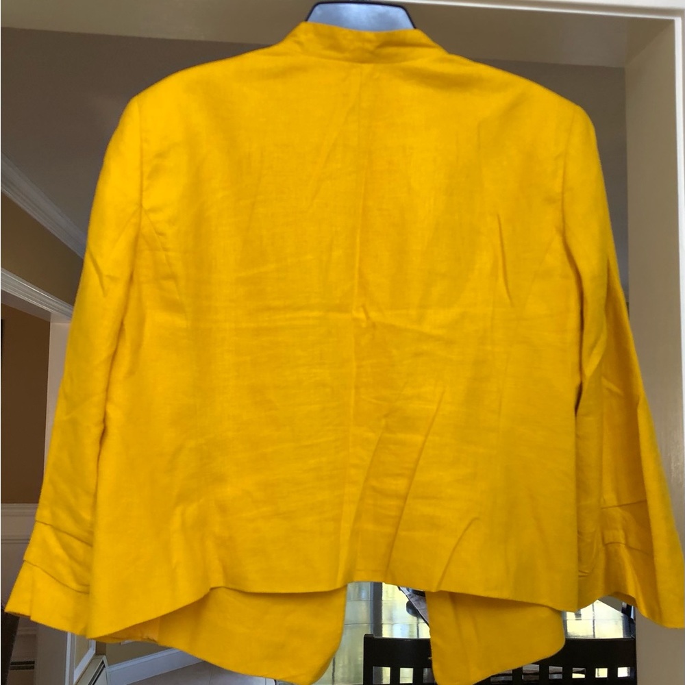 Women’s jacket in bright yellow.  Size XL.